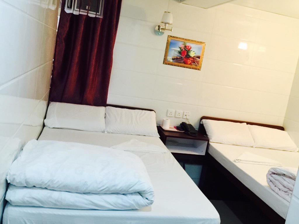 Om Guest House Гонконг Номер фото